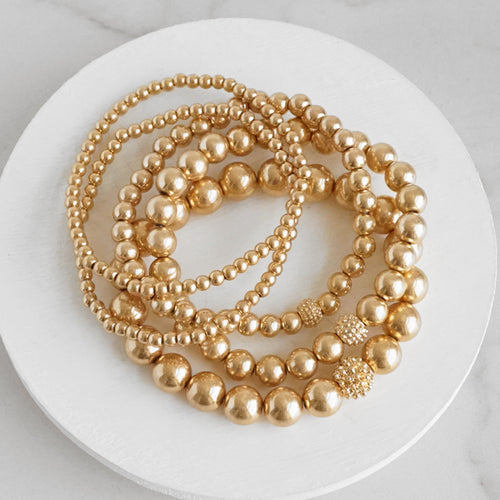 Multi size ball beaded bracelet stack Worn Gold tone bracelet set