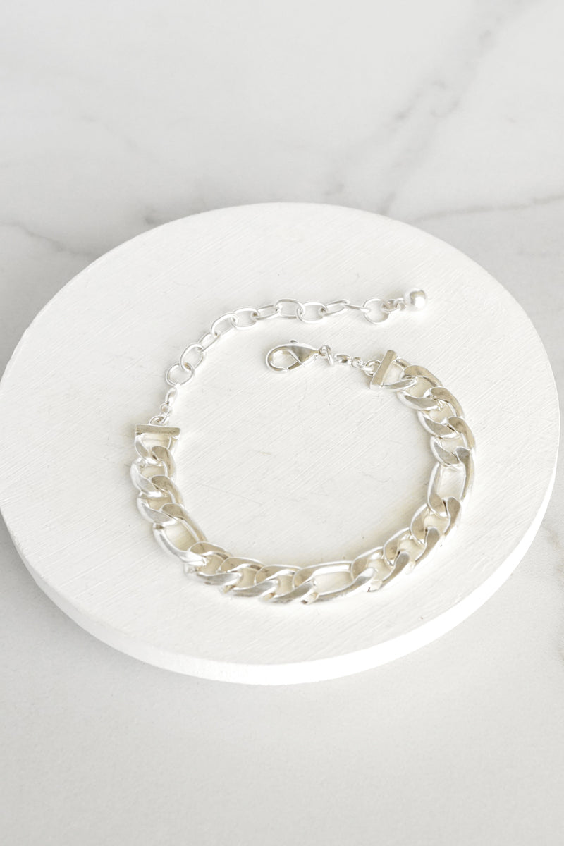 Chunky chain worn silver tone bracelet